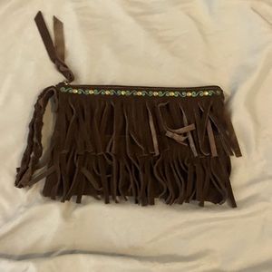 Small clutch purse with braided wristlet carrier